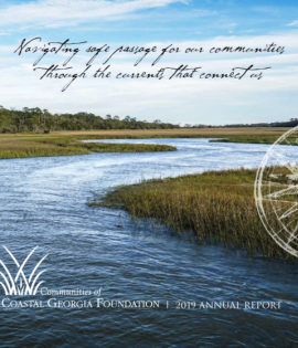 River winding through marshland under blue sky; logo and text overlay.